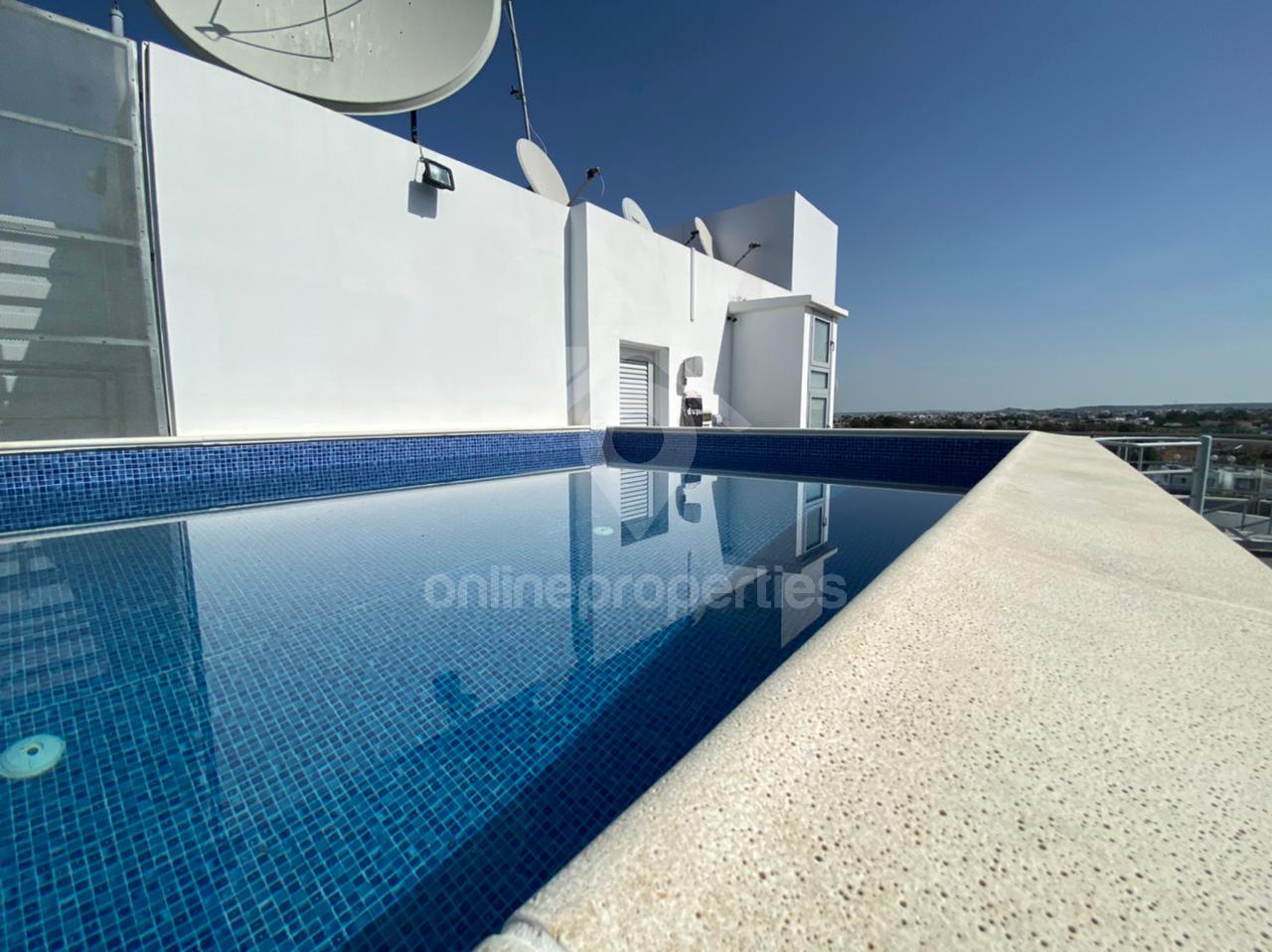 Luxury 2 Bedroom Floor Apartment with Private pool with an extra room on the ground level