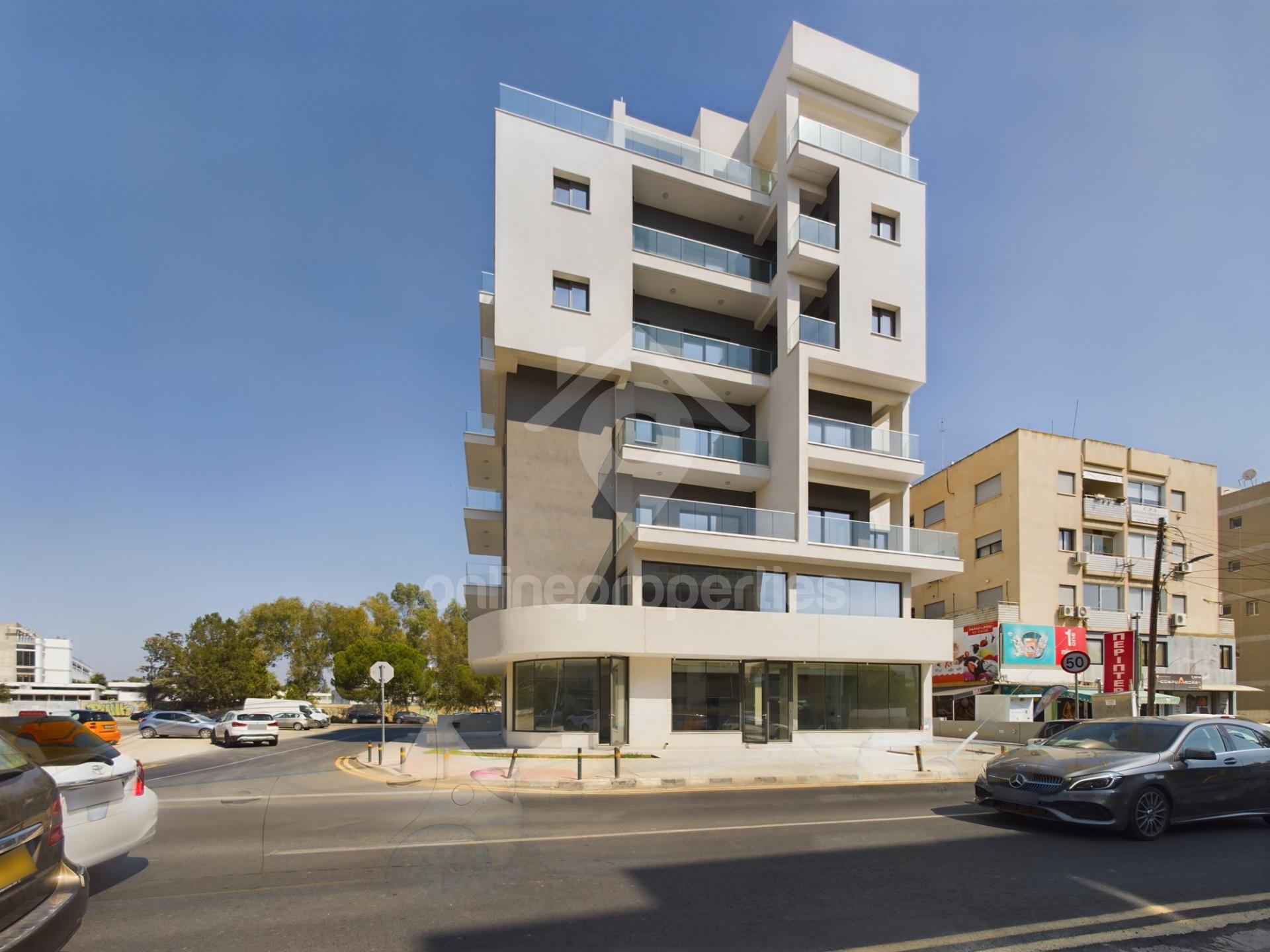 Striking new residential building with ground floor commercial space 