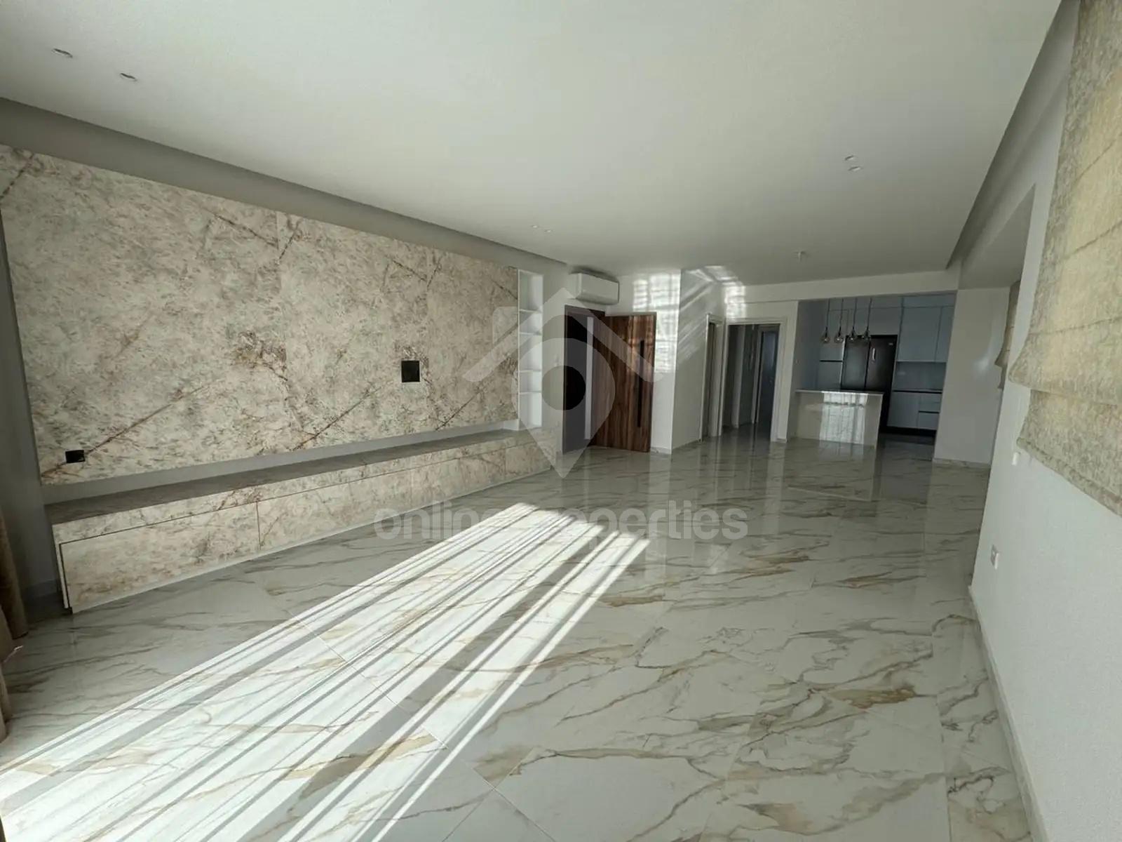 A modern, key-ready apartment on the top floor with elevator access